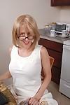 Tattooed mature Charlotte stretches her small asshole in the kitchen