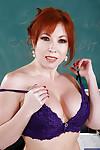 Redhead mature teacher in stockings undressing and rubbing her clit