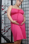 Curvy pregnant georgia peach shows off her big swollen belly