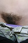 Amateur nerd exposes all natural bush and spreads hairy butthole