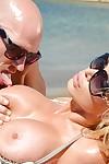 Awesome-looking blonde Nikki Benz is giving a great outdoor blowjob