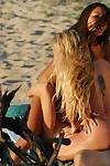 Sultry chicks have a passionate FFM threesome on the beach