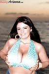 Brunette plumper Arianna Sinn unleashing huge all natural breasts at beach