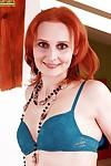 Redheaded mature MILF Bachova modelling solo girl style n bra and panties