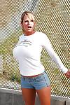 Outdoor posing scene features an amateur blonde milf Kelly Madison