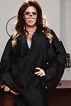 Judge Jessica Jaymes partially disrobes to reveal hot lingerie under gown