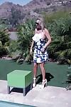 Large breasted housewife Sandra Otterson flashing outdoors in skirt