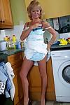Over 50 MILF Cathy Oakley takes time out from housework to strip naked