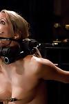 Young blonde Rain DeGrey rides Sybian with hook and claw mouth spreader
