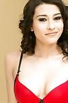 Curly brunette Raven Rockette poses in her red lingerie on cam