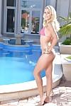 Spicy blonde Christen demonstrates her naked shape at the poolside