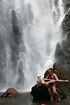 Stunning milf Jesse Jane fucks outdoor in the waterfall on cam