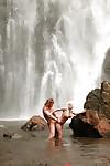 Stunning milf Jesse Jane fucks outdoor in the waterfall on cam
