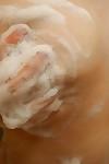 Busty asian MILF taking bath and rubbing her soapy cunt in close up