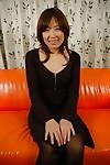 Smiley asian MILF Harumi Yoshie undressing and rubbing her hairy slit