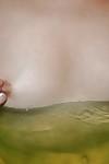 Svelte asian MILF with small titties Mayu Yamano taking bath