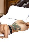 Latina Yurizan Beltran is posing on the bed with spread legs