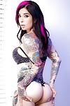 Alternative chick Joanna Angel posing fully clothed in high heels