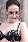 Sexy office babe in glasses Andy Brown stripping off her suit and lingerie