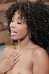 Curly brunette ebony Misty Stone gets naked and plays with her body
