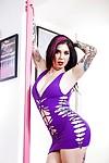 Tattooed amateur babe Joanna Angel posing for seductive fully clothed pics