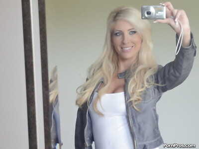 Platinum blonde darling Tasha Reign taking selfies while getting as mother gave birth