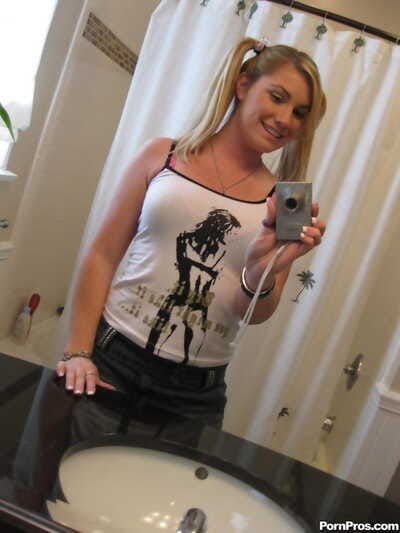 Golden-haired gf Hayden Night snaps selfies in bathroom at the same time as licking a lollipop