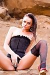 Tori black outside and wet in a corset and