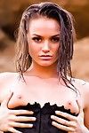 Tori black outside and wet in a corset and