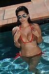 Sexy pornstar sunny leone pops out of her wet bikini