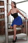 Sexy milf pornstar with big bra buddies Sunny Leone poses in high heels
