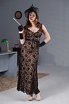 Elegant milf Chanel Preston takes off costume and poses in the office