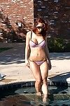 Kylee strutt undresses off her string bikini and has fucking action in the pool
