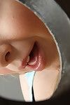 Blond gal sucking cock from glory hole