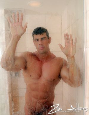 Feel the moist as I take a shower in the first place this shots and flexing my big muscles. Hope you could lather my body with soap sometime.