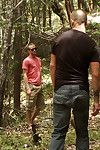 Horny individuals jump on the top of a beefy jock and turn him into a sex slave at a campground.