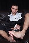 Smelling his feet with an increment of jerking off