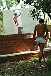 Well-built hunk luring a boy into outdoor oral sex