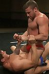 Two big, beefy muscle men with immense cocks battle it broadly on the mat for ultimate control added to the reward of shagging the non-starter s hot, meaty ass.