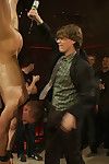 Adam Knox gets used and cum all over his face wean away from a crowd of sex-mad men.