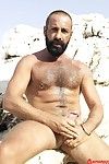 We spotted Tom Neris tanning himself on along to rocks in Greece. His body glistened with sweat while his cock slept quietly across his stomach. Except for once he sensed he was being watched Toms cock started twitching. Once hard, along to man stroked hi