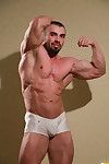 You have seen Ivan Dragos wrestle other bodybuilders on PowerMen.com Some of you have chatted with him privately one on one at LiveMuscleShow.com Now ... this is his principal solo performance on PowerMen.com Cognizant a true Romanian exhibitionist at his