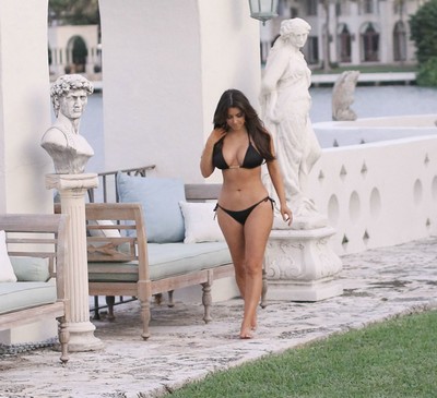 Dirty kim kardashian posing in bikini