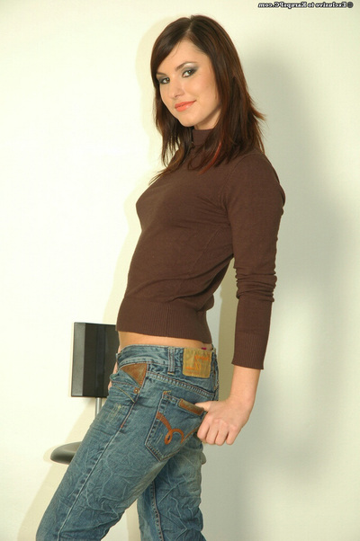 Joyous brunette good in blue jeans undressing and exposing her goods
