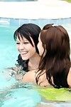 Sticky adolescent lesbos licking and very always other in a pool