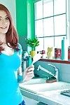 Redhead teen gal Sasha Torture stripping and toying her cum-hole in the kitchen