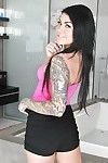 Foxy tattooed princess undressing and playing with she\'s in the shower-room tube