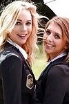Youthful schoolgirls Cali Sparks and Kelly Greene tongue mouth to mouth outdoors