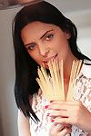 Brunette Elena Rae is cooking and playing with her nice nipples