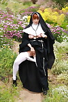 Redheaded nun Penny Pax shows off her major standard bra buddies and and gentile